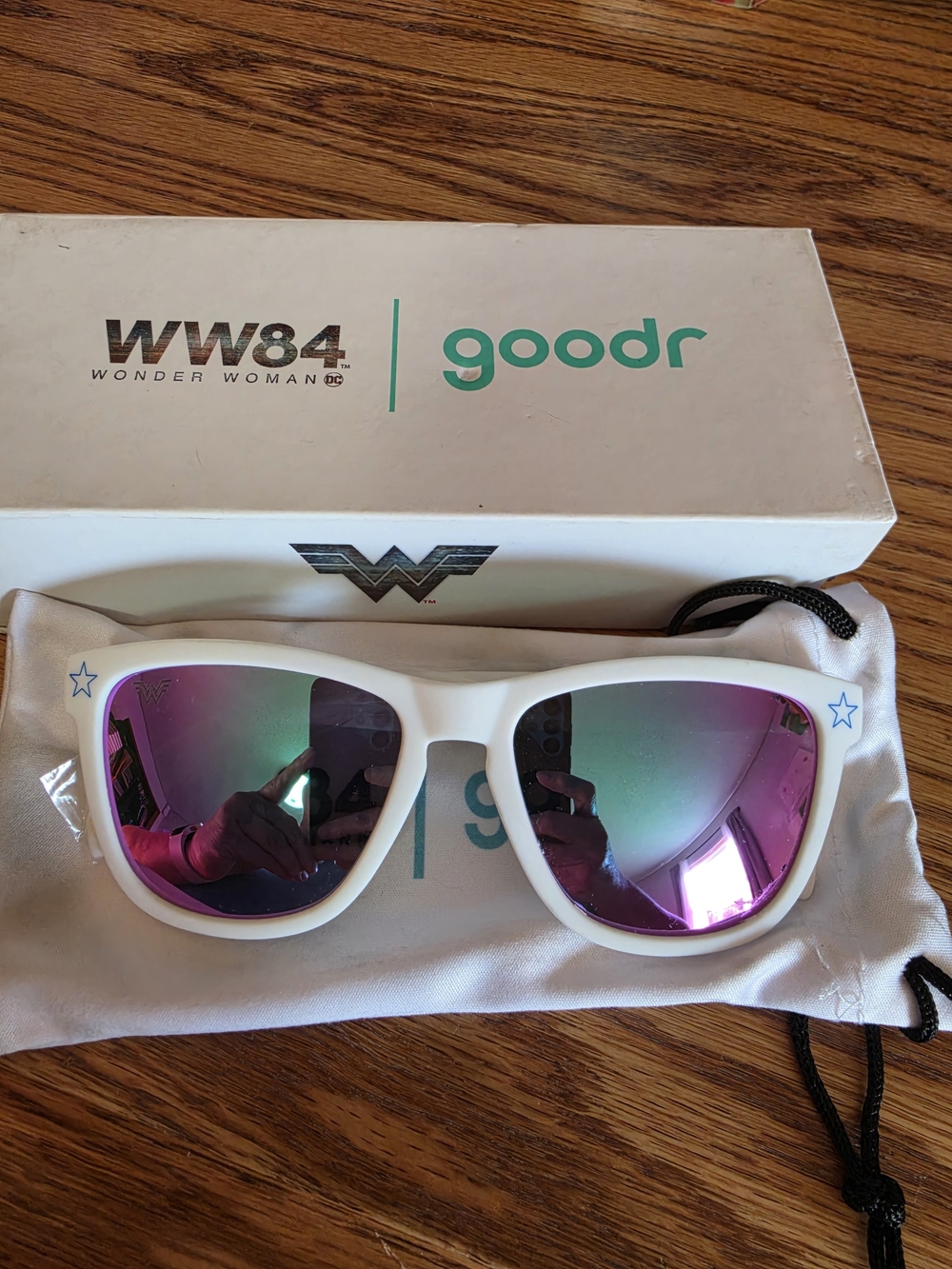 Goodr WW84 White Frame Sunglasses with Pink Mirrored Lenses